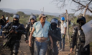 Jhan Carlos FrÃas is arrested trying to protect his community of Roche from eviction in the Cerrejón mining zone in La Guajira, Colombia.