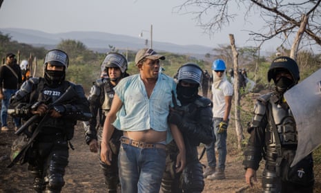 Jhan Carlos Frías is arrested trying to protect his community of Roche from eviction in the Cerrejón mining zone in La Guajira, Colombia.
