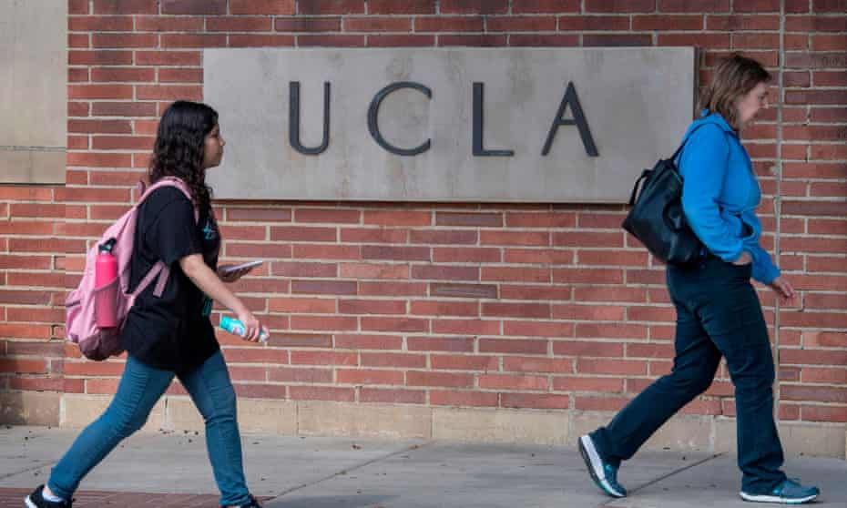 People walk through UCLA campus in Westwood, California on 6 March 2020.