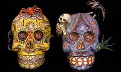 Two colourful papier-mache skulls