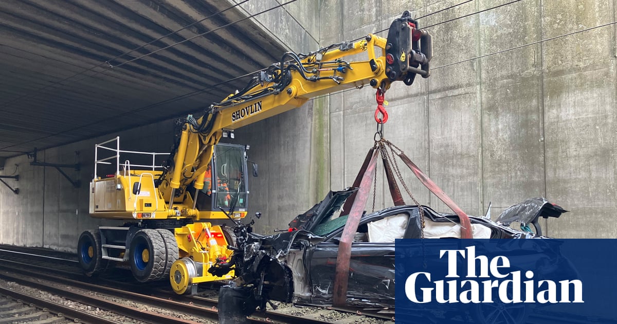 Trains restart after suspected drink-driver crashes on to tracks in Salford Trains restart after suspected drink-driver crashes on to tracks in Salford