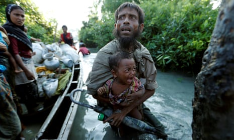 Rohingya refugees arrive to the Bangladeshi side of the Naf river after crossing the border from Myanmar, in Palang Khali, Bangladesh October 16, 2017. REUTERS/Jorge Silva TPX IMAGES OF THE DAY