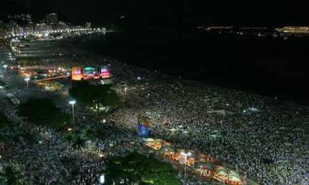 Crowds celebrate the new year at Copacabana Beach, Rio, Brazil