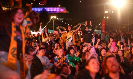 Fans gathered at Darling Harbour celebrate Australia’s win over Canada in the Women’s World Cup.