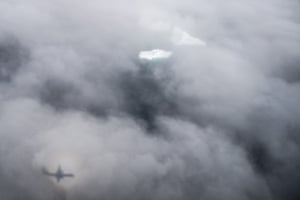 Icebergs are covered by clouds near Kulusuk, Greenland