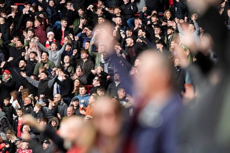 Bristol City fans celebrate their side's first goal during the Championship match against Leicester City at Ashton Gate.