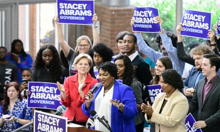 Stacey Abrams faces Georgia secretary of state Brian Kemp in the governor’s race. Kemp had held back at least 53,000 voter registration applications under the ‘exact match’ law.