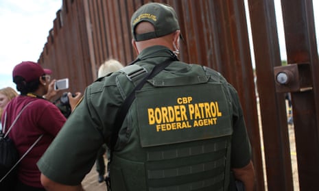 A border patrol agent on the US-Mexico border on 13 October. 
