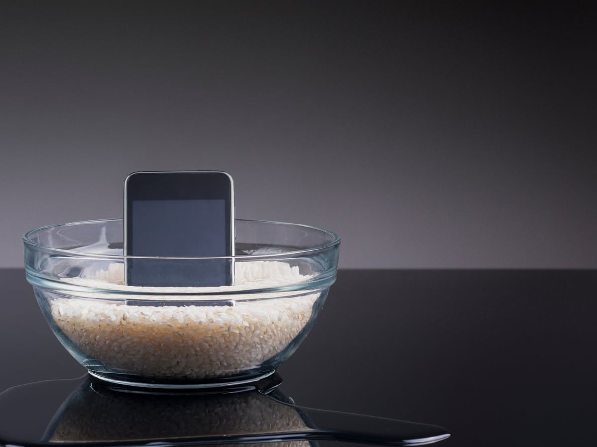 Phone wet and won't turn on? Here's what to do with water damage (hint:  putting it in rice won't work) | Smartphones | The Guardian
