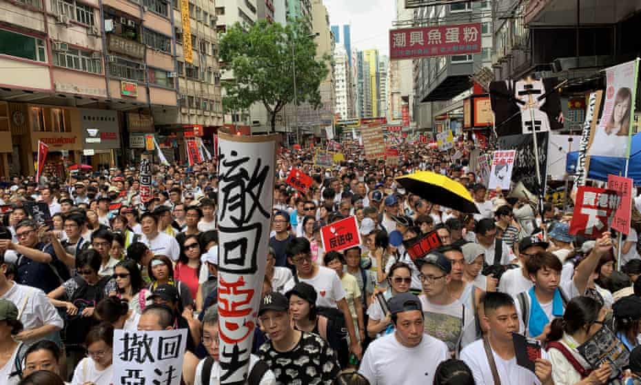 Hundreds of thousands of protesters marched through Hong Kong on Sunday.