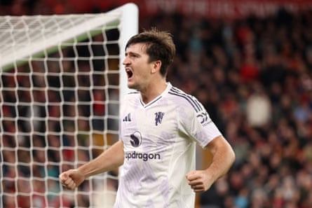 Harry Maguire pumps his fists and roars at the crowd