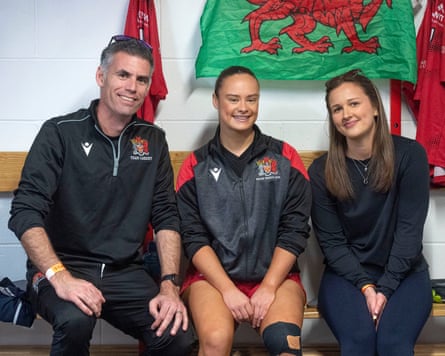 Ffion James of Cardiff University female rugby team (centre) with Dr Peter Theobald and PhD researcher Freya Butcher.