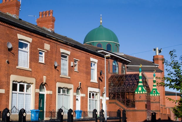 A mosque is seen above terraced houses in Greater Manchester.