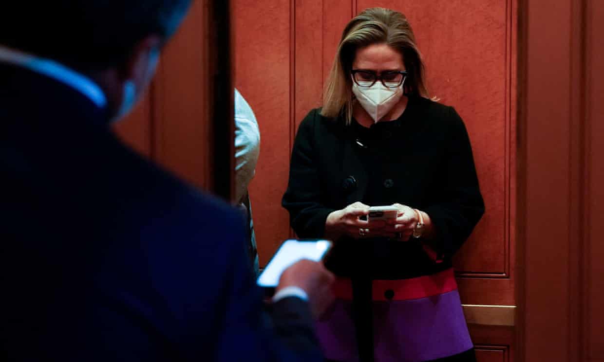 <div class=__reading__mode__extracted__imagecaption>Senator Kyrsten Sinema boards an elevator at the US Capitol. Photograph: Elizabeth Frantz/Reuters<br>Senator Kyrsten Sinema boards an elevator at the US Capitol. Photograph: Elizabeth Frantz/Reuters</div>