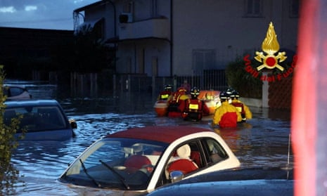 Italian firefighters work in flooded streets in the Tuscany region, Italy, November 3, 2023. Several people died and went missing in the central region of Tuscany as Storm Ciaran battered western Europe.