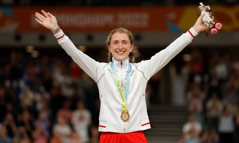 England’s Laura Kenny celebrates on the podium after winning the women’s 10km scratch race.