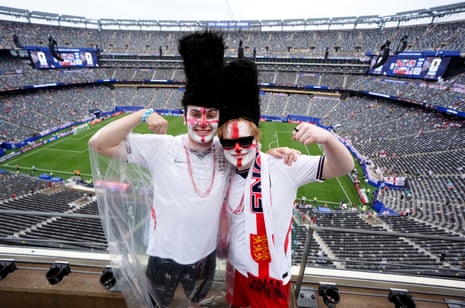 2 fans in busby hats
