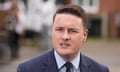 head and shoulder shot of Wes Streeting in blue suit and tie