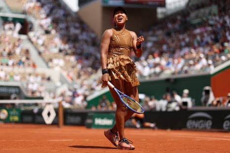 Naomi Osaka celebrates after beating Iva Jovic