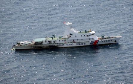 An image released by the Japan coast guard of a Chinese vessel cruising near the Senkaku islands in August 2021