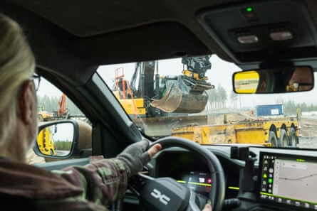 Vesa Hyyryläinen drives past the construction area