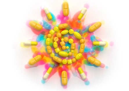 An illustration of coloured pills in a spiral shape