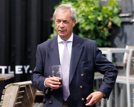 Farage drinks a pint in a pub in Great Bentley, Essex, 8 July.