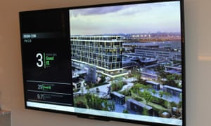 A screen inside a Cordis hotel room shows the air inside is 9.7 times cleaner than that outside.