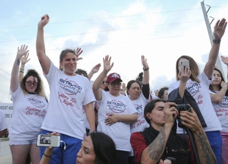 People gather to say a prayer in Baytown, Texas, while protesting against a Houston Methodist Hospital policy that says employees must get vaccinated against Covid-19 or lose their jobs, on 7 June.