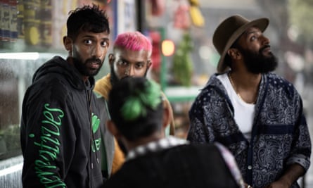 Four characters in film, one with pink hair