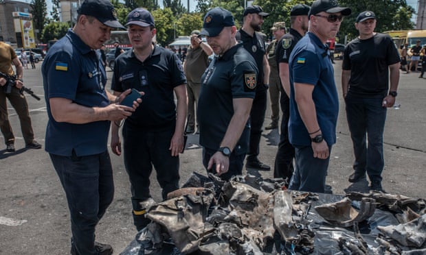 Ukrainian police display fragments of the X-22 missile found on the site