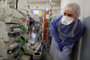 A medical worker, wearing protective gear, works in the Intensive Care Unit (ICU) where patients suffering from the coronavirus disease are treated at Cambrai hospital, France, on 1 April, 2021.