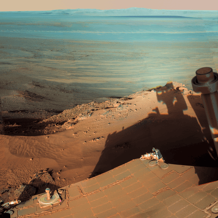 On 9 March 2012, Opportunity stood on the rim of Endeavour crater, with an unobstructed view of its far side 14 miles away. The bedrock in the rim was the oldest Opportunity investigated and was formed during Mars’s earliest, wettest geologic era. The camera’s sensitivity means the colour is exaggerated.