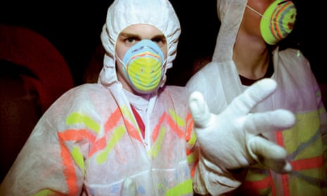 Two guys raving with face masks and white gloves