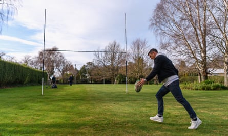 Dan Carter in July 2020 kicks a ball at what had been his first goalposts at his family home in Southbridge, New Zealand