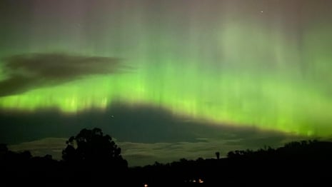 Aurora australis: southern lights ignite the sky across Australia after solar storm – video