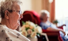 Two senior women sitting in a care home in north-east of England