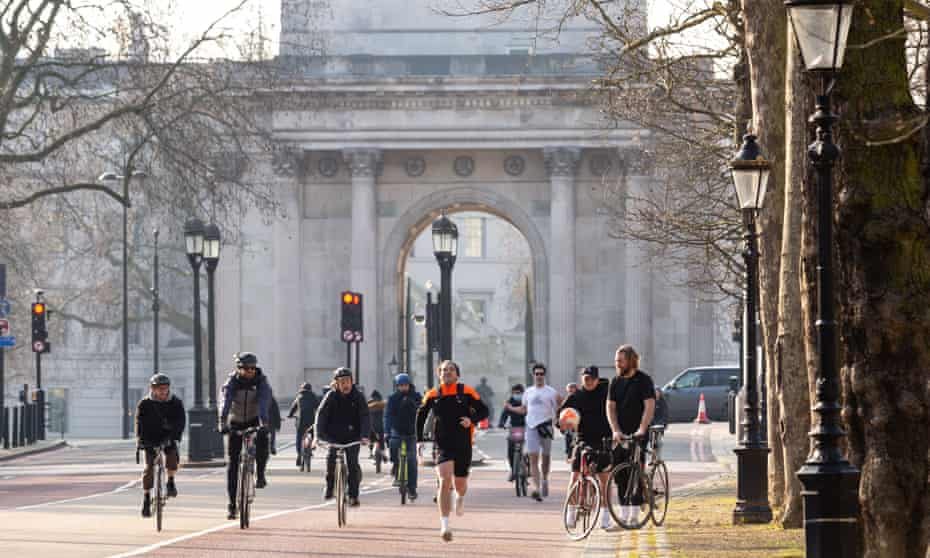 Cyclists on Constitution Hill in London.