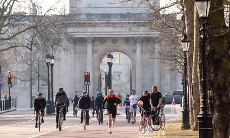Cyclists on Constitution Hill in London.