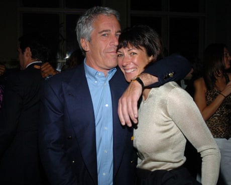 a man and a woman smile while embracing each other