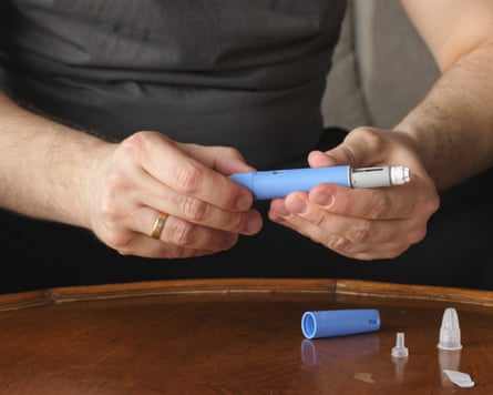 Man preparing Semaglutide Ozempic injection