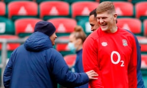 Eddie Jones shares a joke with Jack Willis during England training at Twickenham