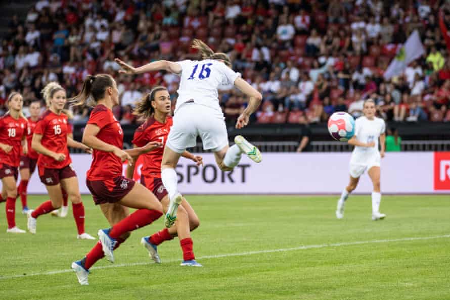 Jill Scott heads in England's fourth goal against Switzerland.