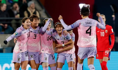 Japan’s Hinata Miyazawa celebrates their first goal with teammates, an own goal scored by Norway’s Ingrid Syrstad Engen.