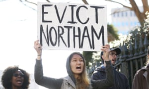 Geraldine Mabagos, of Richmond, holds a sign during a protest in Richmond calling for Governor Ralph Northam to resign on Monday Feb. 4, 2019. Northam has rebuffed widespread calls for his resignation after a racist photo surfaced Friday in his 1984 medical school yearbook page. (Shelby Lum/Richmond Times-Dispatch via AP) 4168.jpg?width=300&quality=85&auto=forma