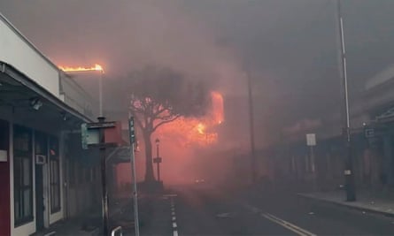 Smoke and flames fill the air from raging wildfires on Front Street in downtown Lahaina, Maui.