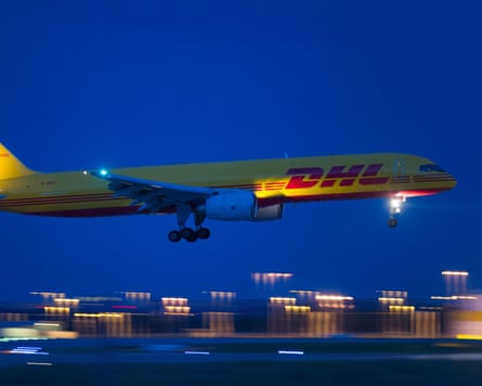 A DHL cargo plane comes into land at Leipzig/Halle airport in Germany.