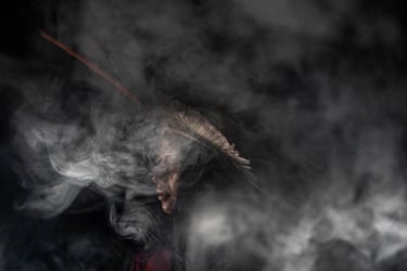 a person surrounded by smoke