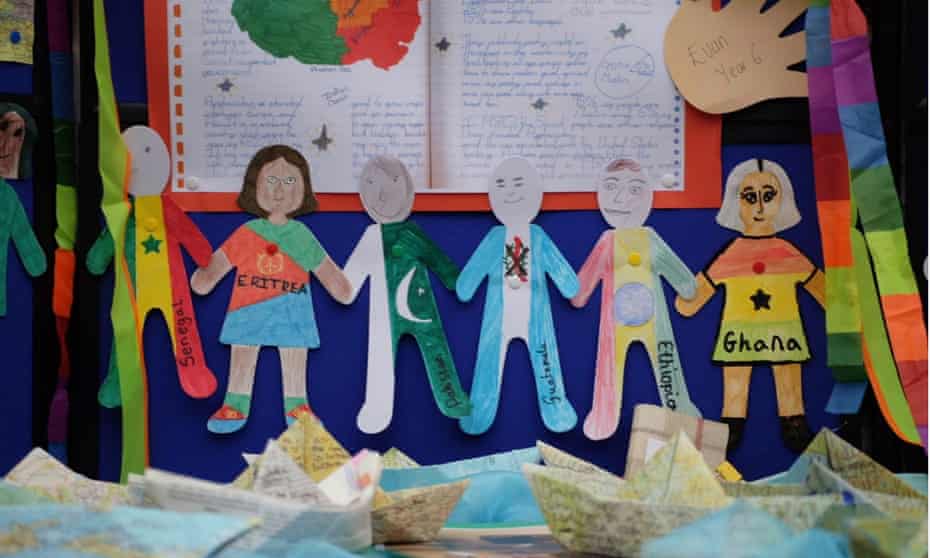 cutouts of children holding hands