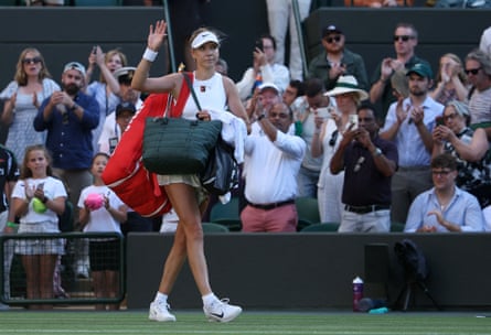 Katie Boulter leaves the court.